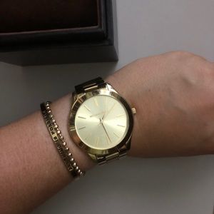 Michael Kors gold women’s watch